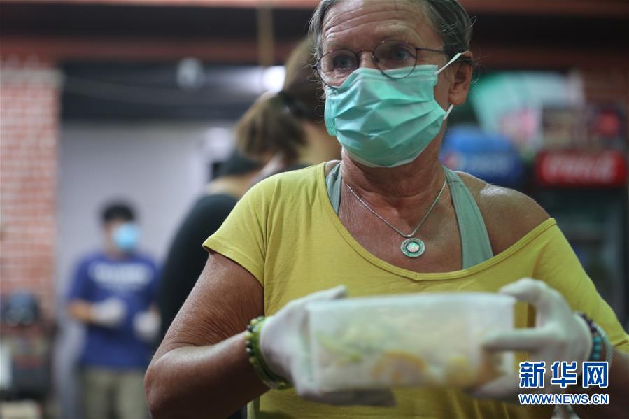 (國(guó)際疫情 ·圖文互動(dòng))(5)通訊:加德滿(mǎn)都中國(guó)人奉獻(xiàn)的“愛(ài)心便當(dāng)”