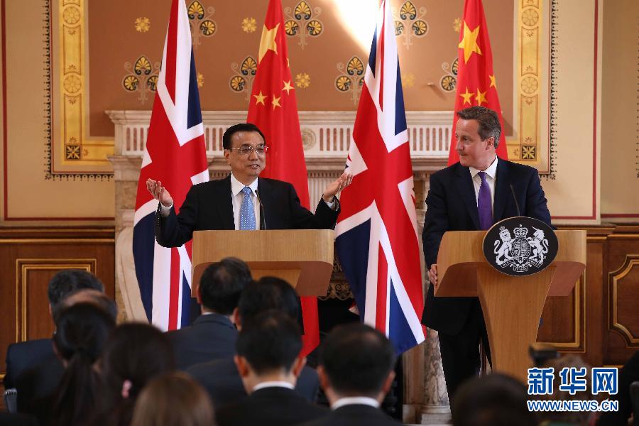 6月17日，國務(wù)院總理李克強同英國首相卡梅倫在倫敦舉行中英總理年度會晤后共同會見記者。新華社記者 龐興雷 攝
