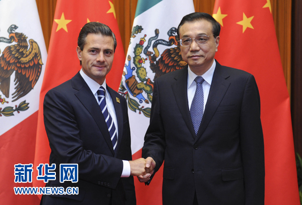 11月11日，國務院總理李克強在北京人民大會堂會見來華進行國事訪問并出席亞太經(jīng)合組織第二十二次領(lǐng)導人非正式會議的墨西哥總統(tǒng)培尼亞。新華社記者張鐸 攝 